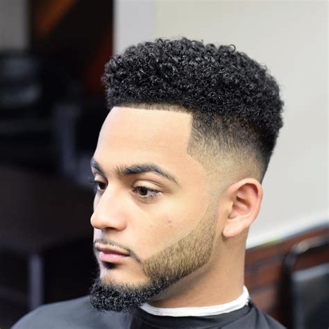 fade curly haircut|curly fade haircut black guy.